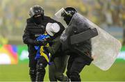 14 June 2022; A pitch invader is restrained by Riot Police officers after the UEFA Nations League B group 1 match between Ukraine and Republic of Ireland at LKS Stadium in Lodz, Poland. Photo by Stephen McCarthy/Sportsfile