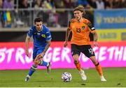 14 June 2022; Jeff Hendrick of Republic of Ireland and Mykola Shaparenko of Ukraine during the UEFA Nations League B group 1 match between Ukraine and Republic of Ireland at LKS Stadium in Lodz, Poland. Photo by Stephen McCarthy/Sportsfile