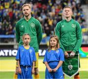 14 June 2022; Republic of Ireland captain James McClean, right, and goalkeeper Caoimhin Kelleher before the UEFA Nations League B group 1 match between Ukraine and Republic of Ireland at LKS Stadium in Lodz, Poland. Photo by Stephen McCarthy/Sportsfile