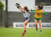 11 June 2022; Rebecca Casey of Waterford in action against Amy Boyle Carr of Donegal during the TG4 All-Ireland Ladies Football Senior Championship Group D - Round 1 match between Donegal and Waterford at St Brendan's Park in Birr, Offaly. Photo by Sam Barnes/Sportsfile
