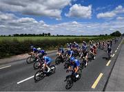 15 June 2022; The peloton makes it way along the Dublin Road to Athy during Stage 1 of the Rás Tailteann 2022 at Horse and Jockey in Parkstown, Tipperary. Photo by David Fitzgerald/Sportsfile