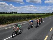 15 June 2022; Dean Harvey of Team Ireland, left, leads a group on the Dublin Road to Athy during Stage 1 of the Rás Tailteann 2022 at Horse and Jockey in Parkstown, Tipperary. Photo by David Fitzgerald/Sportsfile