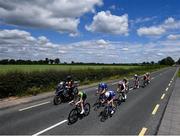15 June 2022; Lorcan Daly of Killarney Cycling Club, left, and Joe Hill of Britain Spirit BSS, right, in the lead group on the Dublin Road to Athy during Stage 1 of the Rás Tailteann 2022 at Horse and Jockey in Parkstown, Tipperary. Photo by David Fitzgerald/Sportsfile