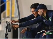 14 June 2022; Republic of Ireland coaches Keith Andrews, left, and John Eustace look at a screen during the UEFA Nations League B group 1 match between Ukraine and Republic of Ireland at LKS Stadium in Lodz, Poland. Photo by Stephen McCarthy/Sportsfile