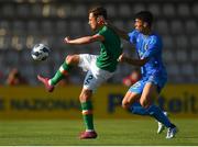 14 June 2022; Lee O'Connor of Republic of Ireland in action against Andrea Carboni of Italy during the UEFA European U21 Championship Qualifying group F match between Italy and Republic of Ireland at Stadio Cino e Lillo Del Duca in Ascoli Piceno, Italy. Photo by Eóin Noonan/Sportsfile