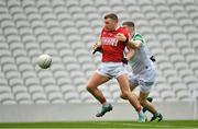 12 June 2022; Brian Hurley of Cork is tackled by Brian Fanning of Limerick during the GAA Football All-Ireland Senior Championship Round 2 match between between Cork and Limerick at Páirc Ui Chaoimh in Cork. Photo by Eóin Noonan/Sportsfile
