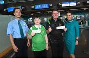 17 June 2022; Special Olympics’ Team Ireland jetted off to Berlin today on Aer Lingus flight EI336 ahead of the 2022 Special Olympics German National Games. Taking place between 19-24 June, these Games will be the largest sporting and humanitarian event in the world and are an important stepping stone towards the 2023 World Summer Games, which will also take place in Berlin. As official airline of Special Olympics Ireland, Aer Lingus ground staff and flight crew were on hand to lend their support and wish Team Ireland well as they embarked on their journey to Berlin. Pictured is Declan Foley, left, and coach Cyril McNamara, with Aer Lingus staff Denis Volkovs and Ciara Poole. Photo by Ramsey Cardy/Sportsfile