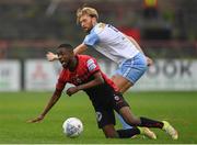 17 June 2022; Junior Ogedi-Uzokwe of Bohemians is tackled by Aaron O’Driscoll of Shelbourne during the SSE Airtricity League Premier Division match between Bohemians and Shelbourne at Dalymount Park in Dublin. Photo by Harry Murphy/Sportsfile