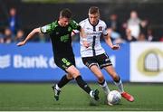 17 June 2022; Daniel Kelly of Dundalk in action against Ronan Finn of Shamrock Rovers during the SSE Airtricity League Premier Division match between Dundalk and Shamrock Rovers at Oriel Park in Dundalk, Louth. Photo by Ben McShane/Sportsfile