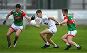 12 June 2022; Ross Harris of Kildare in action against Mayo players Jack Keane, left, and Dara Hurley during the Electric Ireland GAA Football All-Ireland Minor Championship Quarter-Final match between Mayo and Kildare at O'Connor Park in Tullamore, Offaly. Photo by Piaras Ó Mídheach/Sportsfile