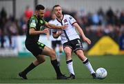 17 June 2022; Robbie Benson of Dundalk in action against Roberto Lopes of Shamrock Rovers during the SSE Airtricity League Premier Division match between Dundalk and Shamrock Rovers at Oriel Park in Dundalk, Louth. Photo by Ben McShane/Sportsfile