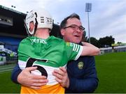 17 June 2022; Offaly selector Johnny Pilkington celebrates with Brecon Kavanagh after their side's victory in the Electric Ireland GAA Hurling All-Ireland Minor Championship Semi-Final match between Offaly and Clare at FBD Semple Stadium in Thurles, Tipperary. Photo by Piaras Ó Mídheach/Sportsfile