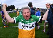 17 June 2022; Offaly supporter Mick McDonagh, from Tullamore, celebrates after his side's victory in the Electric Ireland GAA Hurling All-Ireland Minor Championship Semi-Final match between Offaly and Clare at FBD Semple Stadium in Thurles, Tipperary. Photo by Piaras Ó Mídheach/Sportsfile