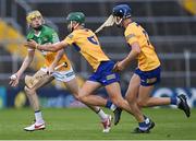 17 June 2022; Daniel Hand of Offaly in action against James Hegarty and Jamie Moylan, right, of Clare during the Electric Ireland GAA Hurling All-Ireland Minor Championship Semi-Final match between Offaly and Clare at FBD Semple Stadium in Thurles, Tipperary. Photo by Piaras Ó Mídheach/Sportsfile