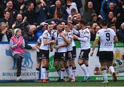 17 June 2022; Robbie Benson of Dundalk, second from left, celebrates with his teammates after scoring their side's first goal during the SSE Airtricity League Premier Division match between Dundalk and Shamrock Rovers at Oriel Park in Dundalk, Louth. Photo by Ben McShane/Sportsfile