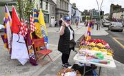18 June 2022; A street vendor at her stall, in Liberty Square, ahead of the GAA Hurling All-Ireland Senior Championship Quarter-Final match between Clare and Wexford at the FBD Semple Stadium in Thurles, Tipperary. Photo by Ray McManus/Sportsfile