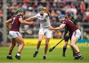 18 June 2022; Robert Downey of Cork is tackled by Fintan Burke and Conor Cooney of Galway during the GAA Hurling All-Ireland Senior Championship Quarter-Final match between Galway and Cork at the FBD Semple Stadium in Thurles, Tipperary. Photo by Ray McManus/Sportsfile