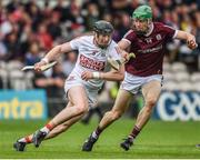 18 June 2022; Damien Cahalane of Cork in action against Cianan Fahy of Galway during the GAA Hurling All-Ireland Senior Championship Quarter-Final match between Galway and Cork at the FBD Semple Stadium in Thurles, Tipperary. Photo by Daire Brennan/Sportsfile