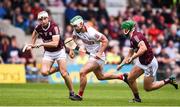 18 June 2022; Shane Kingston of Cork in action against Daithí Burke, left, and Jack Grealish of Galway during the GAA Hurling All-Ireland Senior Championship Quarter-Final match between Galway and Cork at the FBD Semple Stadium in Thurles, Tipperary. Photo by Daire Brennan/Sportsfile