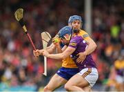 18 June 2022; Shane Reck of Wexford is tackled by Shane O'Donnell of Clare during the GAA Hurling All-Ireland Senior Championship Quarter-Final match between Clare and Wexford at the FBD Semple Stadium in Thurles, Tipperary. Photo by Ray McManus/Sportsfile