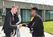 25 June 2022; Republic of Ireland manager Stephen Kenny shakes hands with Michele Kidane Gebretsadek during a Republic of Ireland Refugee Team meet and greet at FAI Headquarters in Abbotstown, Dublin. Photo by Sam Barnes/Sportsfile