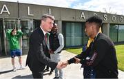 25 June 2022; Republic of Ireland manager Stephen Kenny shakes hands with Michele Kidane Gebretsadek during a Republic of Ireland Refugee Team meet and greet at FAI Headquarters in Abbotstown, Dublin. Photo by Sam Barnes/Sportsfile