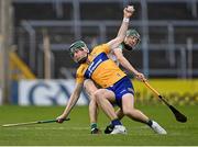17 June 2022; James Organ of Clare in action against Ter Guinan of Offaly during the Electric Ireland GAA Hurling All-Ireland Minor Championship Semi-Final match between Offaly and Clare at FBD Semple Stadium in Thurles, Tipperary. Photo by Piaras Ó Mídheach/Sportsfile