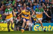 17 June 2022; Jack O'Neill of Clare in action against Offaly players Leigh Kavanagh, 8, and Niall Furlong, 14, during the Electric Ireland GAA Hurling All-Ireland Minor Championship Semi-Final match between Offaly and Clare at FBD Semple Stadium in Thurles, Tipperary. Photo by Piaras Ó Mídheach/Sportsfile