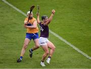 18 June 2022; Conor McDonald of Wexford in action against Conor Cleary of Clare during the GAA Hurling All-Ireland Senior Championship Quarter-Final match between Clare and Wexford at the FBD Semple Stadium in Thurles, Tipperary. Photo by Daire Brennan/Sportsfile