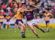 18 June 2022; Jack O'Connor of Wexford in action against John Conlon of Clare during the GAA Hurling All-Ireland Senior Championship Quarter-Final match between Clare and Wexford at the FBD Semple Stadium in Thurles, Tipperary. Photo by Daire Brennan/Sportsfile