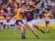 18 June 2022; Jack O'Connor of Wexford in action against John Conlon of Clare during the GAA Hurling All-Ireland Senior Championship Quarter-Final match between Clare and Wexford at the FBD Semple Stadium in Thurles, Tipperary. Photo by Daire Brennan/Sportsfile