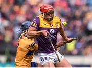 18 June 2022; Lee Chin of Wexford in action against Cian Nolan of Clare during the GAA Hurling All-Ireland Senior Championship Quarter-Final match between Clare and Wexford at the FBD Semple Stadium in Thurles, Tipperary. Photo by Daire Brennan/Sportsfile