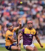 18 June 2022; Lee Chin of Wexford in action against Cian Nolan of Clare during the GAA Hurling All-Ireland Senior Championship Quarter-Final match between Clare and Wexford at the FBD Semple Stadium in Thurles, Tipperary. Photo by Daire Brennan/Sportsfile