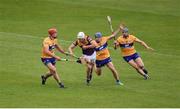 18 June 2022; Rory O'Connor of Wexford in action against Clare players, left to right, Peter Duggan, Shane O'Donnell, and David McInerney during the GAA Hurling All-Ireland Senior Championship Quarter-Final match between Clare and Wexford at the FBD Semple Stadium in Thurles, Tipperary. Photo by Daire Brennan/Sportsfile