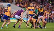 18 June 2022; Peter Duggan of Clare in action against Matthew O'Hanlon of Wexford during the GAA Hurling All-Ireland Senior Championship Quarter-Final match between Clare and Wexford at the FBD Semple Stadium in Thurles, Tipperary. Photo by Daire Brennan/Sportsfile