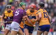 18 June 2022; Peter Duggan of Clare in action against Matthew O'Hanlon of Wexford during the GAA Hurling All-Ireland Senior Championship Quarter-Final match between Clare and Wexford at the FBD Semple Stadium in Thurles, Tipperary. Photo by Daire Brennan/Sportsfile