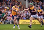 18 June 2022; Ian Galvin of Clare in action against Matthew O'Hanlon of Wexford during the GAA Hurling All-Ireland Senior Championship Quarter-Final match between Clare and Wexford at the FBD Semple Stadium in Thurles, Tipperary. Photo by Daire Brennan/Sportsfile