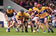 18 June 2022; Ian Galvin, left, and Mark Rodgers of Clare in action against Damien Reck of Wexford during the GAA Hurling All-Ireland Senior Championship Quarter-Final match between Clare and Wexford at the FBD Semple Stadium in Thurles, Tipperary. Photo by Daire Brennan/Sportsfile