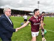 18 June 2022; Team sponsor Pat McDonagh congratulates David Burke after the GAA Hurling All-Ireland Senior Championship Quarter-Final match between Galway and Cork at the FBD Semple Stadium in Thurles, Tipperary. Photo by Daire Brennan/Sportsfile