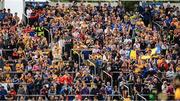 18 June 2022; Clare supporters, amongst the 34,640 attendance, cheer from the Killinan End Terace during the GAA Hurling All-Ireland Senior Championship Quarter-Final match between Clare and Wexford at the FBD Semple Stadium in Thurles, Tipperary. Photo by Ray McManus/Sportsfile