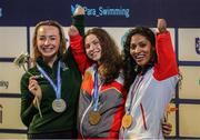 18 June 2022; Medalists, from left, Ellen Keane of Ireland, silver, Anastasiya Dmytriv of Spain, gold and Katarina Roxon of Canada, bronze, after the final of the 100m breaststroke SB8 class on day seven of the 2022 World Para Swimming Championships at the Complexo de Piscinas Olímpicas do Funchal in Madeira, Portugal. Photo by Ian MacNicol/Sportsfile