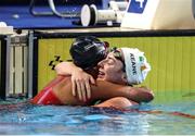 18 June 2022; Ellen Keane of Ireland and Katarina Roxon of Canada embrace after competing in the final of the 100m breaststroke SB8 class on day seven of the 2022 World Para Swimming Championships at the Complexo de Piscinas Olímpicas do Funchal in Madeira, Portugal. Photo by Ian MacNicol/Sportsfile