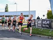 18 June 2022; Lindsay Gordon of Newcastle & District AC, left, and Brian Geraghty of Sli Cualann AC during the Dunshaughlin 10km Kia Race Series in Dunshaughlin, Co Meath. Photo by David Fitzgerald/Sportsfile