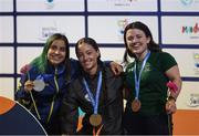 18 June 2022; Medalists, from right, Nicole Turner of Ireland, bronze, Ellie Marks of United States, gold, and Sara Blanco Vargas of Columbia, silver, after the final of the 50m butterfly S6 class on day seven of the 2022 World Para Swimming Championships at the Complexo de Piscinas Olímpicas do Funchal in Madeira, Portugal. Photo by Ian MacNicol/Sportsfile