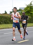19 June 2022; Hugh Armstrong of Ballina AC, left, and Peter Somba of Dunboyne AC during the Irish Life Dublin Race Series – Tallaght 5 Mile at Tallaght in Dublin. Photo by David Fitzgerald/Sportsfile