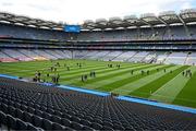 19 June 2022; Cavan and Sligo, left, players walk the pitch before the Tailteann Cup Semi-Final match between Sligo and Cavan at Croke Park in Dublin. Photo by Ray McManus/Sportsfile