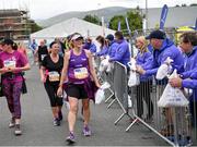 19 June 2022; Participants receive t shirts after the Irish Life Dublin Race Series – Tallaght 5 Mile at Tallaght in Dublin. Photo by David Fitzgerald/Sportsfile