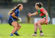19 June 2022; Niamh Keenaghan of Cavan in action against Sinead Walsh of Mayo during the TG4 All-Ireland SFC Group A Round 2 match between Cavan and Mayo at Glennon Brothers Pearse Park in Longford. Photo by Ben McShane/Sportsfile