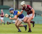 19 June 2022; Ciarán Foley of Tipperary in action against Rory Burke of Galway during the Electric Ireland GAA Hurling All-Ireland Minor Championship Semi-Final match between Tipperary and Galway at the LIT Gaelic Grounds in Limerick. Photo by Michael P Ryan/Sportsfile