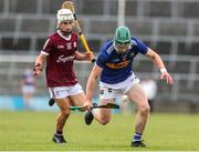 19 June 2022; Chris O'Donnell of Tipperary in action against Conor Dolphin of Galway during the Electric Ireland GAA Hurling All-Ireland Minor Championship Semi-Final match between Tipperary and Galway at the LIT Gaelic Grounds in Limerick. Photo by Michael P Ryan/Sportsfile